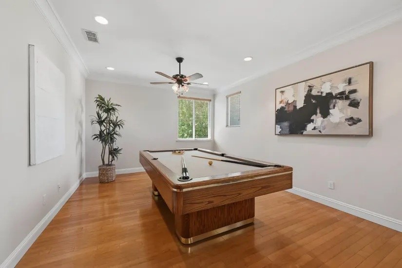 Flexible recreation billiards room in Diamond Oaks Roseville luxury home